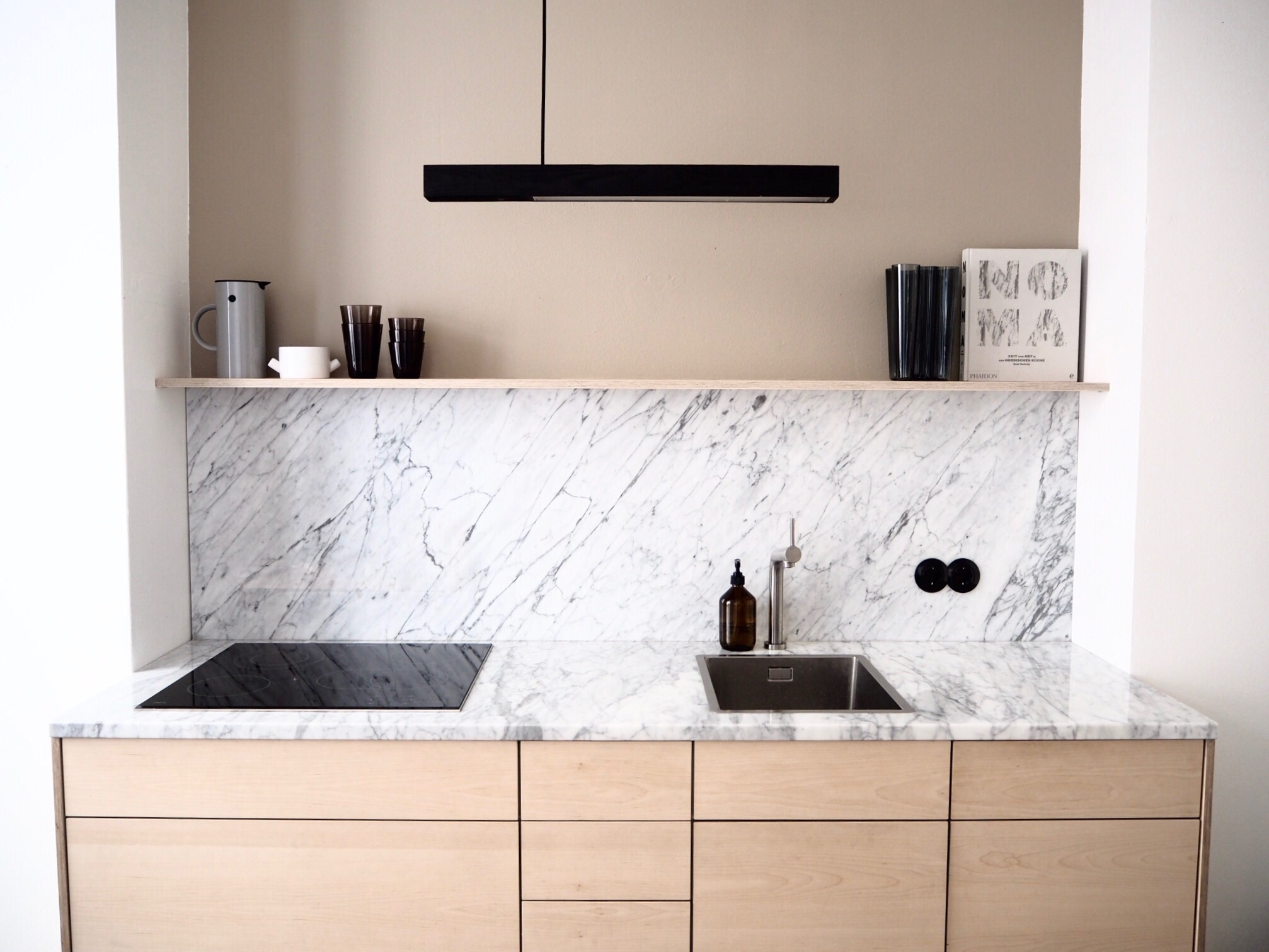 Selina Lauck - home tour - marble and wood kitchen