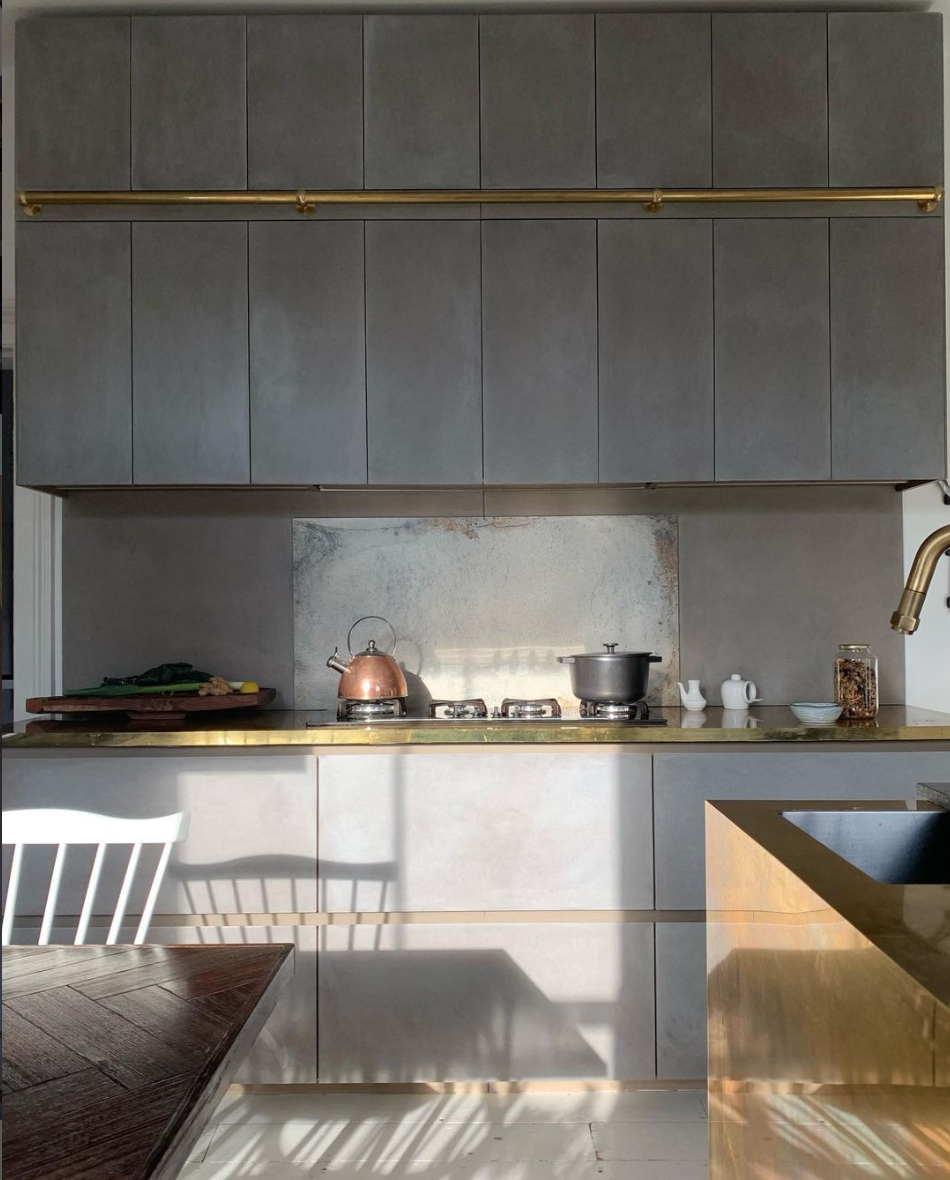 Modern kitchen with brass countertop