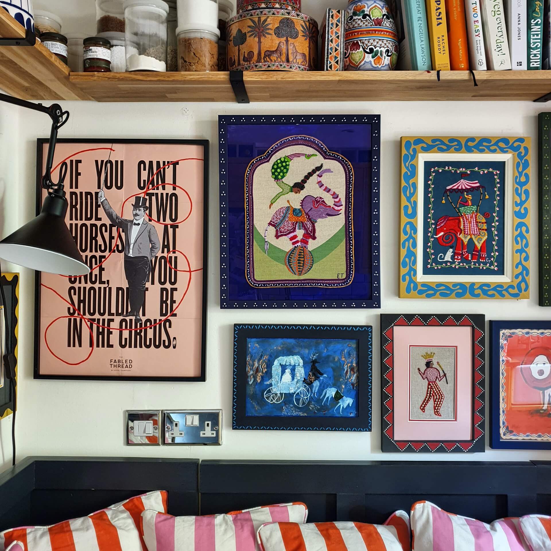 Inside Eppie Thompson founder of The Fabled Thread's embroidery studio with framed embroidery kit on wall