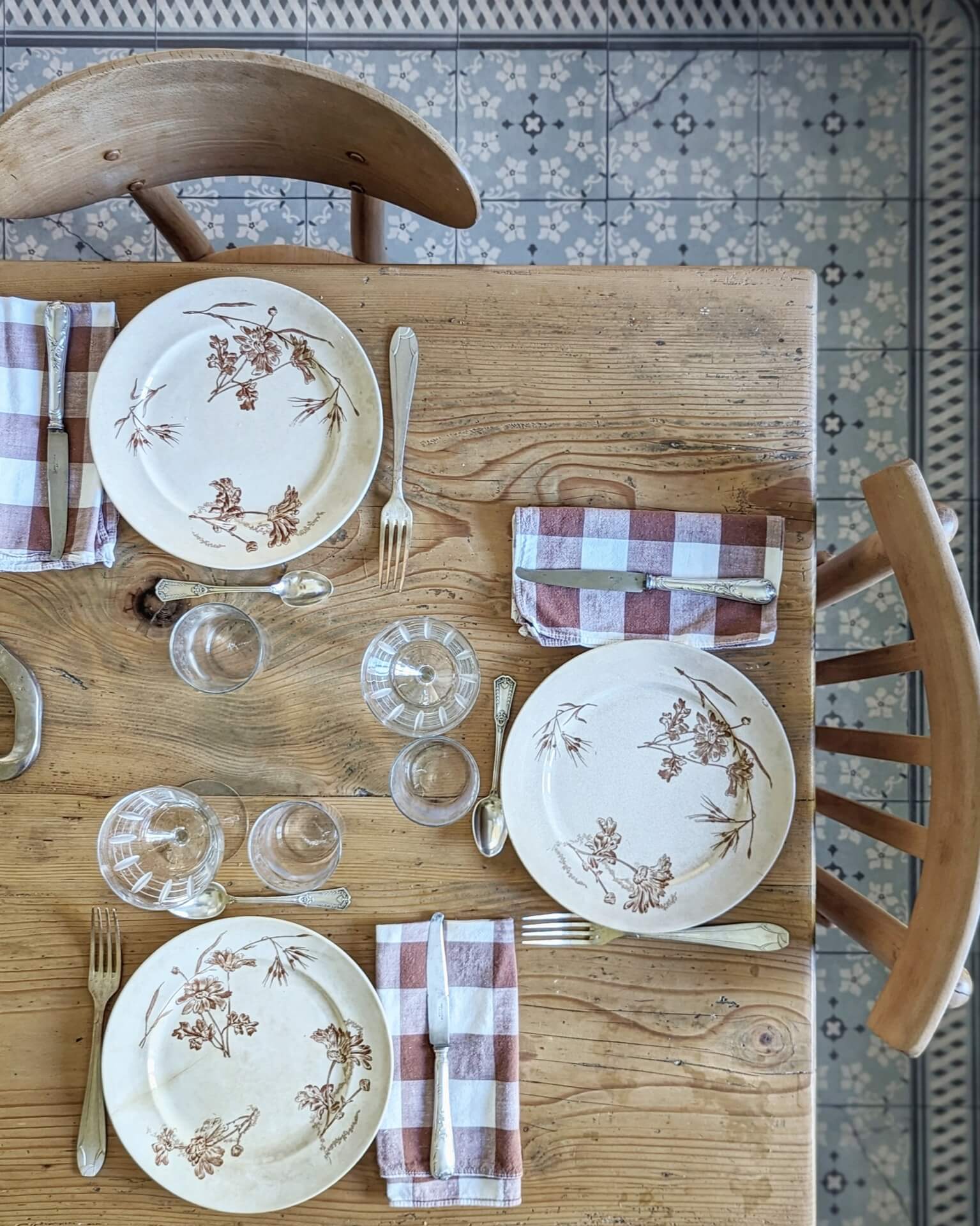 overhead shot of a pretty dinner table with vintage crockery